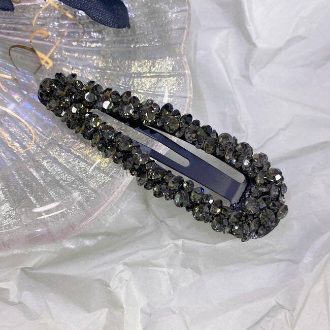 black teardrop snap hair clips